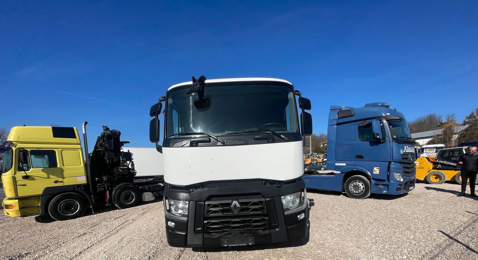 Three trucks in a lot